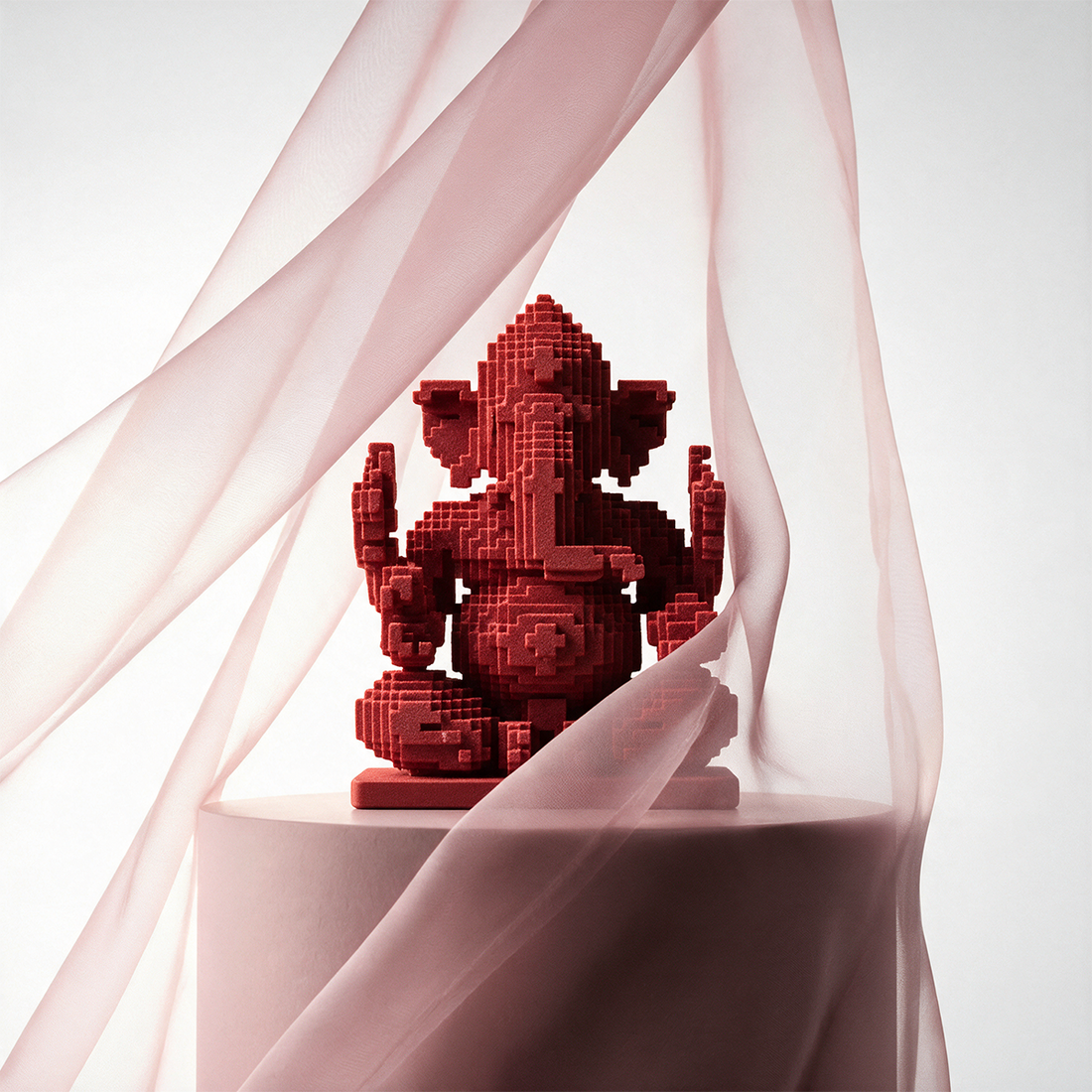Moh – red AeriQ Pixel Ganpati Ganesha idol on a pink pedestal with a sheer drape