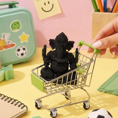 Black AeriQ Pixel Ganpati Ganesha idol in a miniature trolley