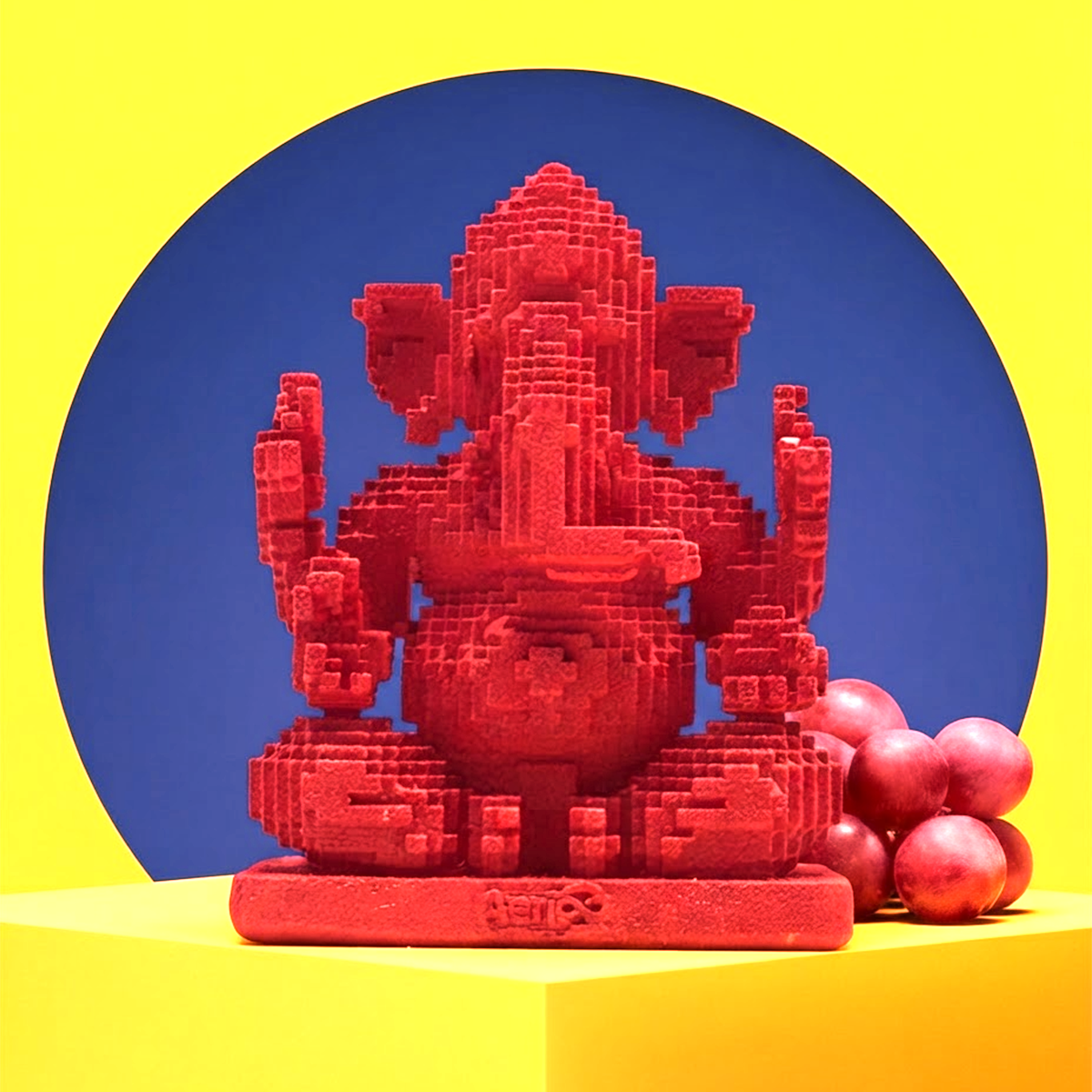 Red AeriQ Pixel Ganpati Ganesha idol against a blue circle backdrop