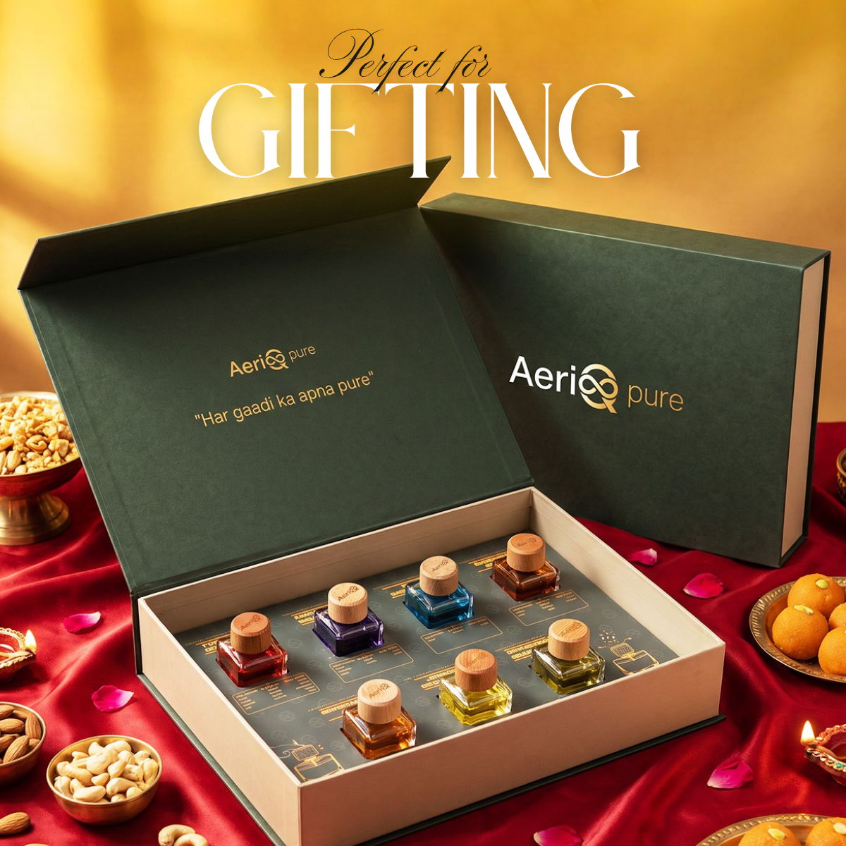 AeriQ Pure Experience Box open, showing all 7 car perfumes in a green gift box