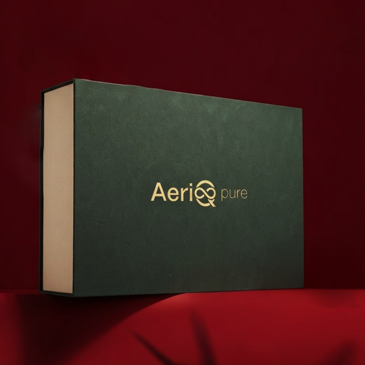 Closed AeriQ Pure Experience Box in deep green with gold logo